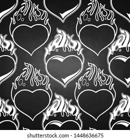 Graphic seamless pattern of flaming hearts. Vector old school tattoo design. Traditional style