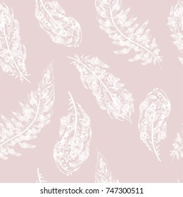 Graphic seamless pattern with the image of bird feathers arranged in a chaotic manner.  Imitation of embroidery on fabric. Vector illustration. White feathers on a gently pink background Hand drawing.