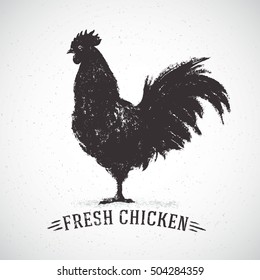 Graphic silhouette of a rooster and inscription,hand-drawn illustration.