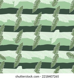 Graphic tropical pattern, palm leaves seamless floral background. Abstract leaf wallpaper. Nature wallpaper. Exotic plant foliage backdrop. For fabric design, textile print, wrapping, cover