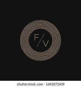 Graphic vector illustration of two letters F and V inside the tree rings