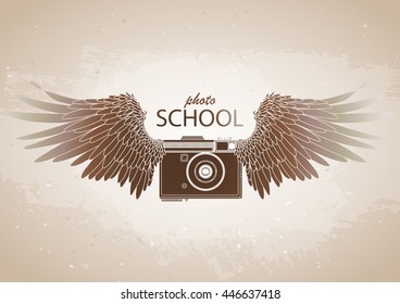 Graphic vintage camera with two wings. Conceptual art for web sites, business cards and other corporate identity for the photographers.