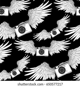 Graphic vintage camera with two wings. Vector seamless pattern. Coloring book page design for adults and kids.