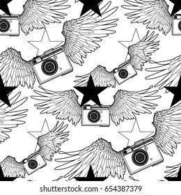 Graphic vintage camera with two wings and stars. Vector seamless pattern. Coloring book page design for adults and kids.