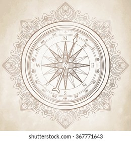Graphic wind rose compass drawn in line art style. Nautical  vector illustration isolated on old paper texture