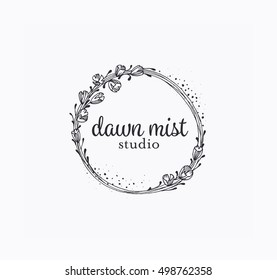 Graphical floral label with hand drawn abstract botanical flowers, round vector frame, logo