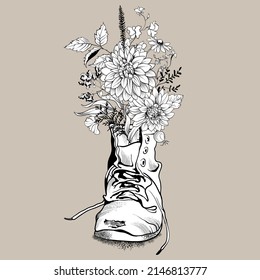 Graphical flowers in an old tattered shoe. Black and white floral composition. Vector illustration