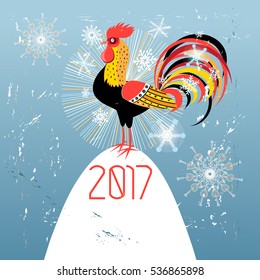 Graphical greeting card with a rooster on a blue background with snowflakes.