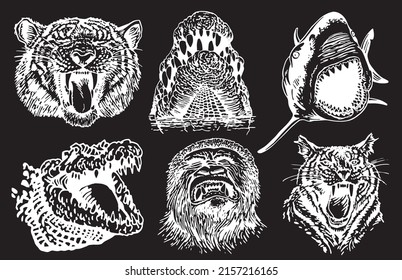 Graphical  set of heads of animals with grins isolated on black,vector engraved elements