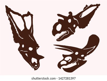 Graphical vintage set of dinosaur skulls , vector tattoo illustration