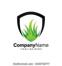 grass care logo in shield symbol