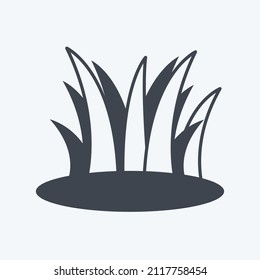 Grass Icon in trendy glyph style isolated on soft blue background
