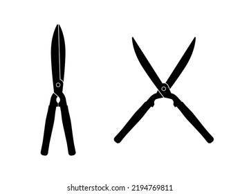 Grass shears vector silhouette black color isolated. Scissors vector concept. 