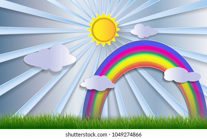 Grass, sky, cloud, rainbow and sun shine on a bright day. The paper is cut into a picture. For use in printed media, brochures or to be used in articles in nature and environment.