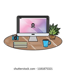 grated office computer with books and coffee beverage