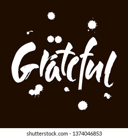 Grateful hand drawn postcard. Vector lettering for Thanksgiving day. Ink illustration. Modern brush calligraphy. Isolated on black background.