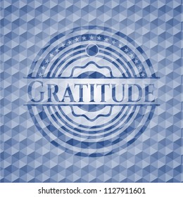 Gratitude blue badge with geometric pattern.