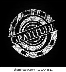 Gratitude chalkboard emblem written on a blackboard