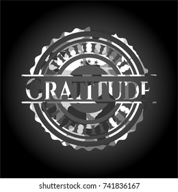 Gratitude on grey camouflaged texture