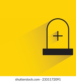 tumba con sombra sobre fondo amarillo