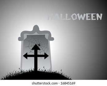 gravestone with spider and net on gray