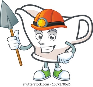 Gravy boat for dish with miner mascot.