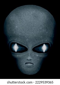 Gray Alien creature with black bagground