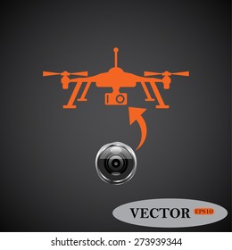 Gray background. Orange icon. Quadrocopter. icon. vector design