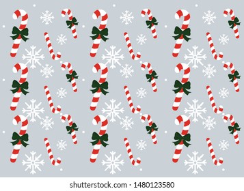 gray background with snowflakes and Christmas candy, pattern