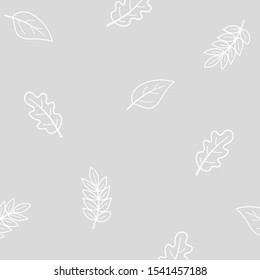 Gray background with white silhouettes of leaves
