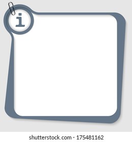 gray box with info sign and dark paper clip