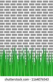 gray brick wall and green grass from below.