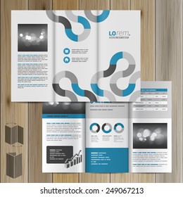 Gray brochure template design with blue round pattern. Cover layout
