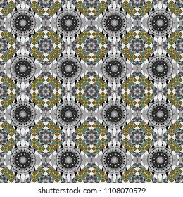 Gray, brown and black ethnic geometric motif seamless pattern in gray, brown and black on abstract background.