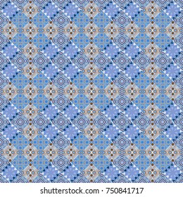 Gray, brown and blue ethnic geometric motif seamless pattern in gray, brown and blue on abstract background.