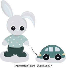 A gray bunny in romper shoes and a polka-dot T-shirt rolls a toy car
