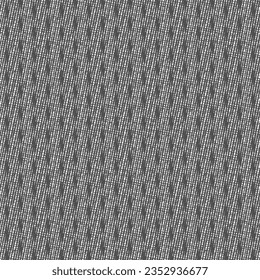 Gray canvas with drop-shaped black spots. Monochrome textured background, sprinkled with simple marks from place to place. Abstract vector.