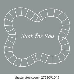 A gray card with a wavy tiled ribbon frame surrounding the words Just for You in a friendly script.