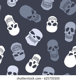 Gray Cartoon Skulls Seamless Background.
