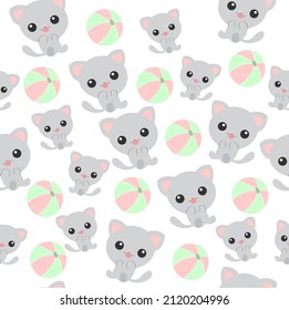 Gray cat with a ball on a white background