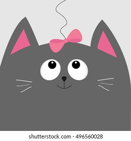 Gray cat head looking at pink bow hanging on thread. Cute cartoon character. Pet baby collection Card. Flat design. Vector illustration.