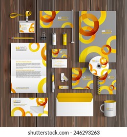 Gray corporate identity template design with yellow and orange round elements. Business stationery