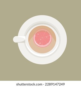 taza de té gris con cítricos (limón, pomelo) en un plato gris durante una pausa