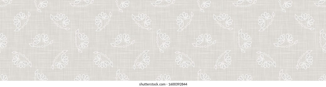 Gray french country style linen texture border background. Printed with white daisy flower. Natural ecru flax fibre bloom seamless border pattern. Classic yarn close up weave texture ribbon trim edge.