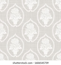 Gray french linen texture background printed with white primrose motif. Natural ecru antique medallion seamless pattern. Organic woven leaf foulard paisley wallpaper, vintage homespun textile damask.