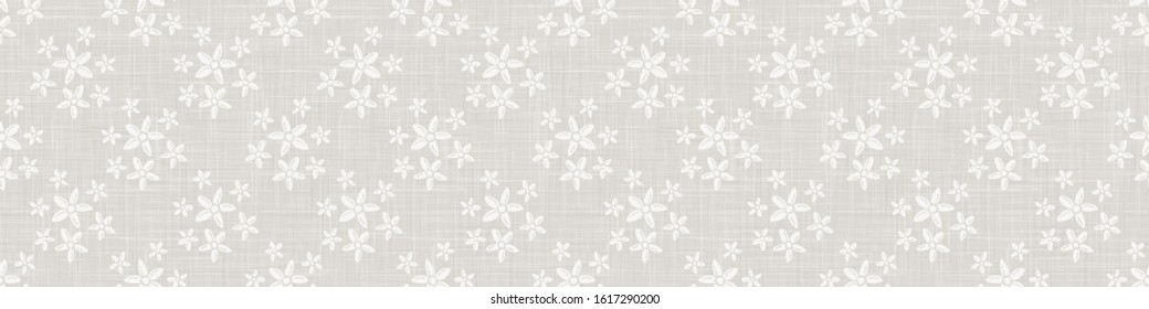 Gray french linen texture border background printed with white daisy flourish. Natural ecru summer country style seamless ribbon edge pattern. Ornamental woven floral medallion. Chic wedding trim