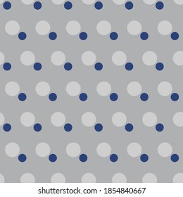 Gray geometric pattern of small and large circles. Dark blue circles on a gray background.