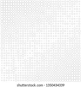 Gray halftone from circles and rings on a white background