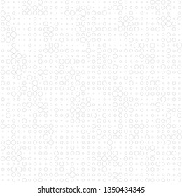 Gray halftone from circles and rings on a white background
