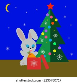 gray hare under the Christmas tree with a gift